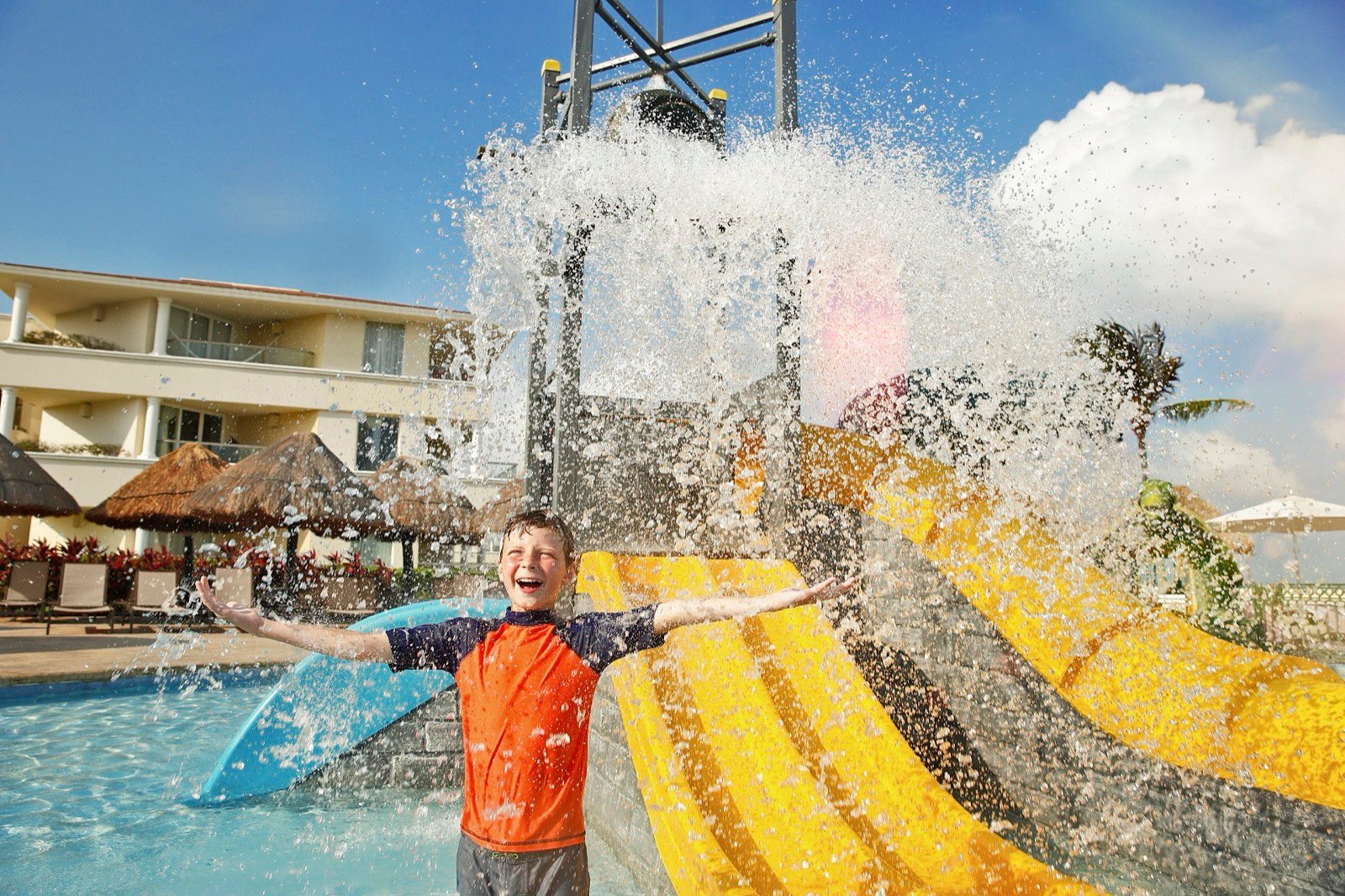 Child enjoying a Moon Palace kids pool splash area